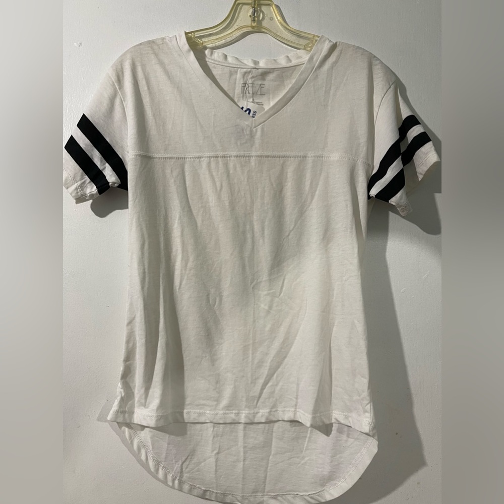 White and black tee.
